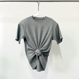 女性用Tシャツファッショナブルで汎用性のあるへそパッド肩短袖TシャツY2Kノットツイストニットスレッドラウンドネックトップ女性230516