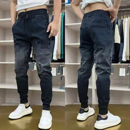 Męskie dżinsy jeansowe 2023 Stylowy przylot elastyczny pasek Black Cowboy Men's Worbgy Pants Gradient Fashion Bawełna kombinezon spodnie Człowiek