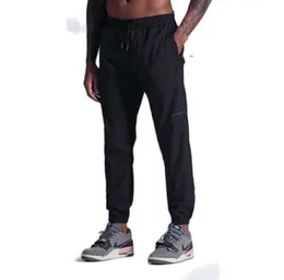 Наряд йоги Lulu с мужскими повседневными спортивными штанами Бесплатная Продвижение доставки быстро высыхающая дышащая тонкая высокая эластичность.