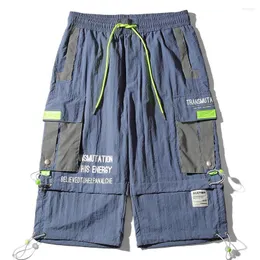 Calça masculina 2023 shorts de carga de verão homens soltos nylon casual ao ar livre praia original design original de vários bolsos