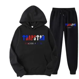 Tracksuit Trapstar 브랜드 인쇄 스포츠웨어 남자 16 색 따뜻한 두 조각 세트 느슨한 까마귀 스웨트 셔츠 바지 조깅 통기성 디자인 98ess