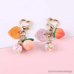 Keychains Heart Peach Rainbow Ball Keychain Key Ring for Friend Lovers Cartoon Caixa de frutas românticas Bolsa de frutas