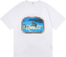 Rhude Mens TシャツRhude Summer Fashion Cotton TシャツLone Wolf Printed Hip-Hop Men and Women with Leidure Sports Joker Loose Short-Sleeved Shirt。