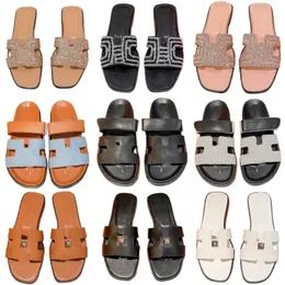 Neue Designer-Hausschuhe aus echtem Leder, Designer-Schuhe, Hooploop-Strandschuhe, modische Damen-Sandalen, Buchstaben-Marken-Freizeitschuhe, offene Zehen, flache Schuhe, rutschfeste Outdoor-Schuhe