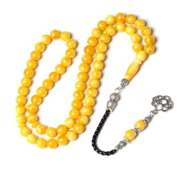 Abbigliamento in resina gialla tasbih ambra ambra fatta perle di preghiera fatte a mano 8mm 66 rosary metal navigate islam dono musulmano misbaha tesbih