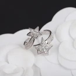 Pierścienie musujący cyrkon 925 Sterling Silver Five Flower Star Open Pierścień Kobiet moda