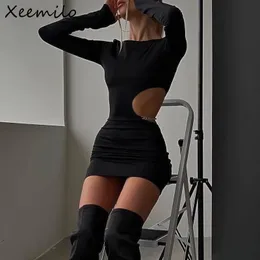 Grundläggande avslappnade klänningar Xeemilo Sexig midja ihålig miniklänning svart långa ärmar Slim 2023 Elegant Women Metal Chain Decoration Vestidos 230522