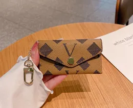 클래식 지퍼 양각 제로 지갑 열쇠 가방 오래된 꽃 카드 가방 미니 작은 가방 코인 가방 짧은 지갑 절묘한 다목적 캐주얼 캐주얼 D22052703CY