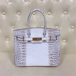 A bolsa de moda é platina apenas 30. O mesmo crocodilo de couro de vaca portátil One ombro Mensageiro Casual Feminino