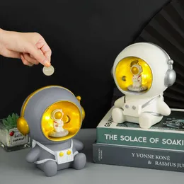 Obiekty dekoracyjne figurki prezent urodzinowy astronautów prezent urodzinowy astronauta Mała świnka bankowa lampa urodzinowa Prezent urodzin