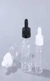 Garrafas de embalagens cosméticas de óleo essencial 15ml 30ml 60ml 120ml Recipiente de gotas de vidro transparente com tampas brancas à prova de crianças pretas2734013