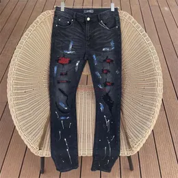 Designer Clothing Amires Jeans Denim Pants Amies Black Paint Graffiti Inlaid with Red Diamond Stretch Jeans High Street Torn Mens Womens Long Pants Distressed Rippe