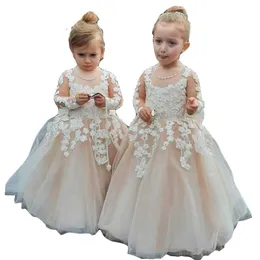 2023 Bella Blush Pink Flower Girls Abiti a maniche lunghe Collo gioiello Appliques in pizzo Tulle Perline di cristallo Fiocco 3D Lunghezza pavimento floreale Bambini Compleanno Ragazza Abiti da spettacolo