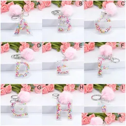Chave de letra de letra Keychains 26 Glitter Hollowed Pink Inglês Alfabeto Ring Ring Women Handbag Crafts com Puffer Ball Gift Drop Del Dhses