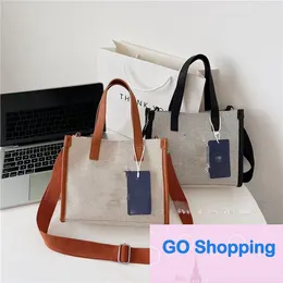 Koreanische Nischen-Einkaufstasche, Frühling, große Kapazität, Presbyopie-Handtasche, Damenmode, Schulter-Crossbody-Pendlertasche