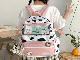 Mochila impermeable con estampado de vaca bonita, mochilas de gran capacidad para niñas, mochilas escolares para mujer, bolso de hombro a la moda Kawaii 2924630