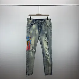 Yeni tasarımcı erkek kot sıska pantolon gündelik lüks kot pantolon erkekler moda sıkıntılı yırtık ince motosiklet motorcu denim hip hop pantsq10