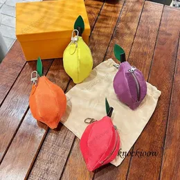Monedero de lujo con forma de limón, mini lindo bolso con forma de fruta juguetona a la moda, bolso para llaves, bolso de lápiz labial dulce para mujer, bolso de marca con nombre 230527
