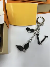 Högkvalitativ nyckelringsmodkvinnor Män handgjorda bilnyckelringar Stylish Buckle Designer Luxury Key Chain Bag med låda och dammpåsar