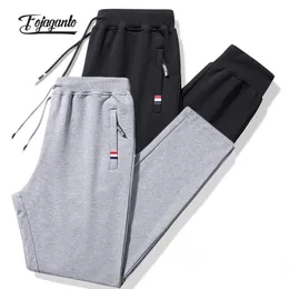 Pants FOJAGANTO Men's Spring and Autumn Trend Casual Pants Youth Cotton Slim Sports Sweatpants Solid Color Thin Section Nine Pants Men