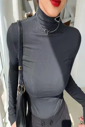 Kvinna stickar tees skjortor designer hoodie kvinnors topp yoga skjorta höga halsar långa ärmar kvinnlig smal stil med budge nack tees topps 6786389