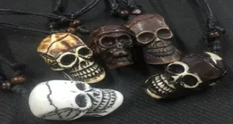 12 pcs YQTDMY Whole Fashion jewelry Carved Skull Charm Necklace Jewelry Wood Beads Rope Adjustable45912096760546