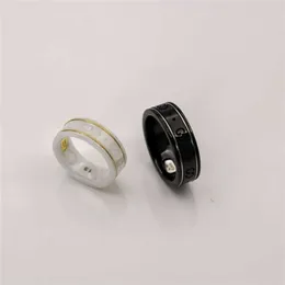 designer jewelry bracelet necklace ring Qi personality electroplating 18K gold white ceramic ring men women black steel stone Couple Wedding Ring Gift
