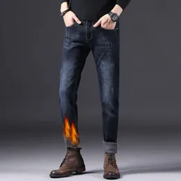 Pantalones vaqueros gruesos de invierno de lana elásticos ajustados rectos de mezclilla azul oscuro cálidos para hombres pantalones largos de marca de diseñador de moda