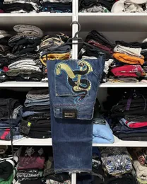 Kvinnor s jeans American Street Hip Hop Outer Wear Pocket Snake Dagger Print Fashion Loose Jeans Harajuku Y2K High midjebyxor för män och kvinnor 231201