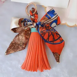 شريط القوس Women keychains وشاح bowknot بو الجلود الشرافل شرابة السلسلة الرئيسية الحلقة حامل الأزياء قلادة المجوهر