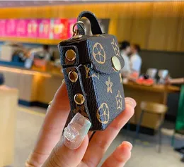 Fashion Designer Airpods Case Keychains Trinkets PU Leather Key Rings Chains Jewelry Brown Flower Pendant Bag Charms Keyrings Car Keys Holder Fashion Accessories