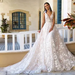 Abiti da sposa in pizzo bohémien A Line Abiti da sposa lunghi sexy con scollo a V profondo senza schienale 2024 Abito da sposa romantico Boho Beach estivo su misura