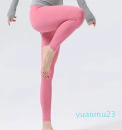 Leggings da yoga Nessuna linea di imbarazzo Pantaloni a nove punti Leggings per il sollevamento dell'anca da donna Vita alta Sensazione di nudo Fitness
