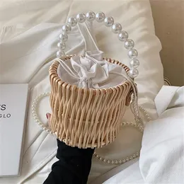 Borse e portamonete in paglia da donna Borsa estiva in rattan Borsa da viaggio in vimini intrecciata con secchiello Borsa da viaggio da spiaggia con catena di perle per ragazze 220525270C