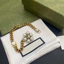 Novo estilo pulseiras mulheres pulseira manguito corrente designer carta jóias de couro falso 18k banhado a ouro aço inoxidável das mulheres 2305