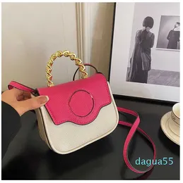 Bolso de mano de color a la moda para mujer de diseñador de cabeza de belleza, bolso pequeño de cuero suave con tapa, bolso cruzado de tendencia para mujer