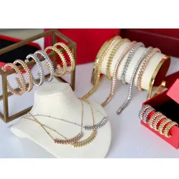 Varumärkessmycken Set för kvinnor Guldpläterad Rive Steam Punk Party Fashion Clash Designörhängen Halsband Armband Ring3026