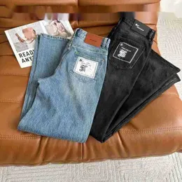 Damesjeans Designer jeans dames nieuw halfhoogKardashian Kardashian zelfde paragraaf stijging rits knoop rechte pijpen veelzijdige ruches pijpen stijlvolle letters