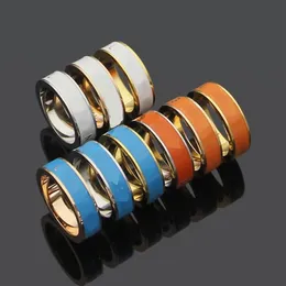 Högkvalitativ älskare Kvinnor Designer Ring White Orange Blue Dripping Oil Gold Plated Luxurious Letter Titanium Steel Aclank Rings253C