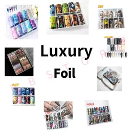 Stickers Decals 10 Roll Designer Nail Art Transfer Foil Set Luxury Brand and Butterfly Nail Art Foil Transfer Stickers 4*100cm 231205