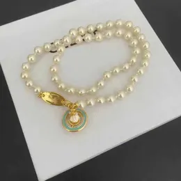 Nya mode damer halsband hängen säljer märke halsband planet halsband saturn pärla halsband satellit clavicle kedjahög kvalitet
