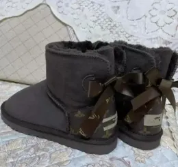 2023 جودة أعلى uggit رواية L القوس و U Women Boots Snow Boots ناعم مريح من جلد الغنم