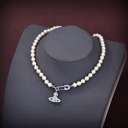 Collier femme marque chaîne de perles chaude collier planète collier de perles saturne chaîne de clavicule Satellite atmosphère Punk Viviene