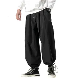 Pantaloni da uomo Design Pantaloni Harem con coulisse Pantaloni da jogging larghi da uomo Pantaloni stile giapponese con cavallo largo Pantaloni larghi casual 231208