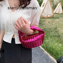 Italien Jodie Hangbag 2023 Neue handgewebte Tasche mit hellem Gesicht für Damen, koreanische Ausgabe, einfarbig, beliebter Knoten, handgefertigtes Knödelbrötchen