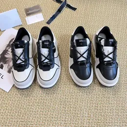 Scarpe da donna di marca Sneakers abbinate in pelle bovina con giunture di colore bianco e nero