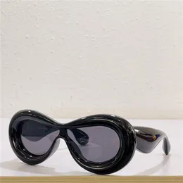 Neue Mode-Sonnenbrille 40099, spezielle Designfarbe, aufgeblasener Maskenformrahmen, Avantgarde-Stil, verrückt, interessant, mit Gehäuse 254c