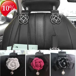 Ny universal Camellia Flower Car Seat Back Hooks Portable Hanging förvaringskrok för väskväska Tygdekoration Biltillbehör flickor