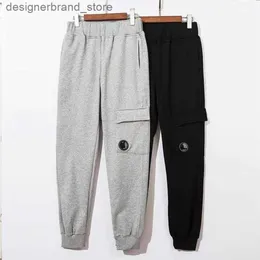 Pantaloni da uomo jogger Pantaloni sportivi tascabili elasticizzati 2023 Trend Stile britannico Cerniera Sport all'aria aperta Pantaloni casual High Street cp aziende compagnie aziende AP