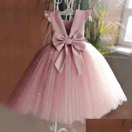 Abiti da ragazza 2021 Ragazze di fiore rosa pesca per la cerimonia nuziale Perline Backless Ragazza Festa di compleanno Abito da sera Tle Abito da ballo principessa G1 Otlkz